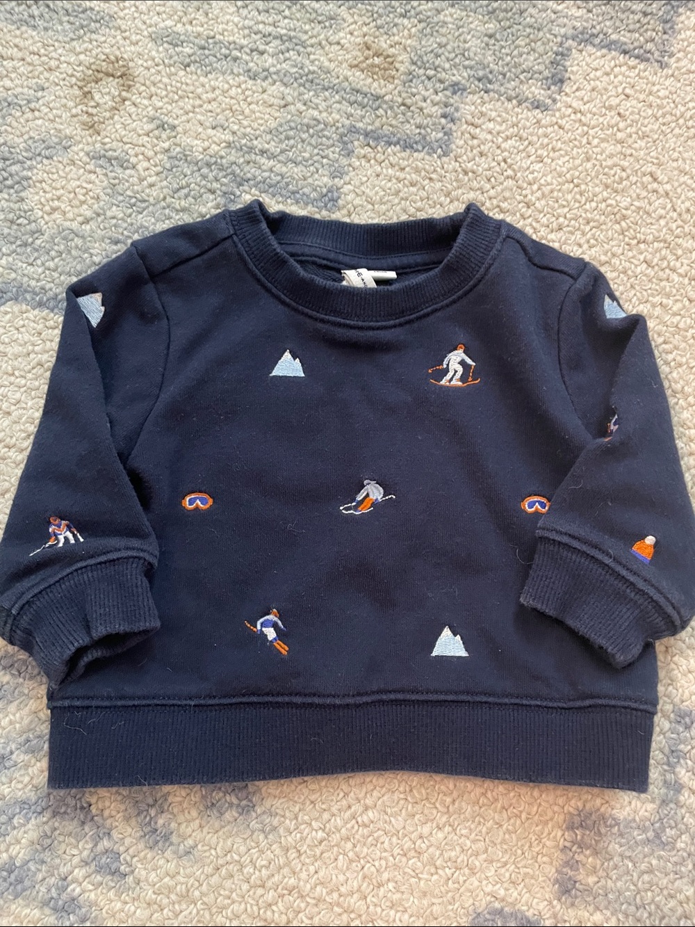 Janie and Jack Navy Sweatshirt with Orange & White embroidered Ski Motifs